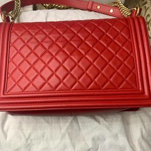 Brand new Chanel shoulder bag with gold chain hardware.
